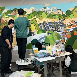 致公党北京市委对口帮扶张家村墙绘项目绘制上墙  报道之一