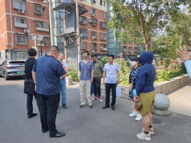 20230616致公党西城区委组织开展老旧小区改造实地调研.jpg